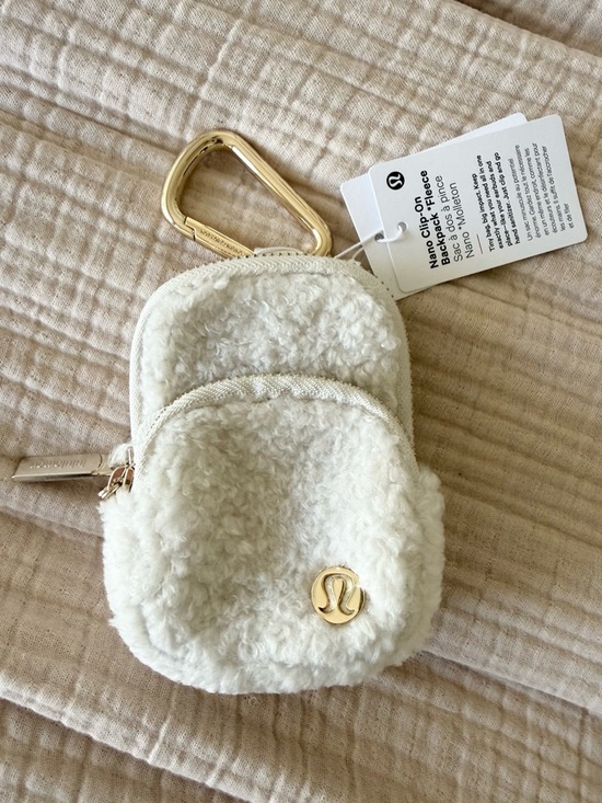 lululemon athletica Handbags - NWT Lululemon Nano Clip-On Fleece Backpack with Gold Hardware - Light Ivory